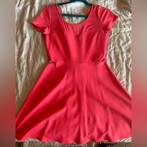 Bright orange skater dress